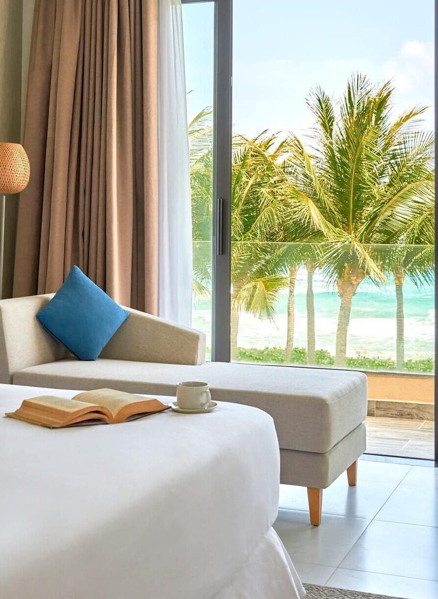 Master bedroom in a 4BR Beachfront villa